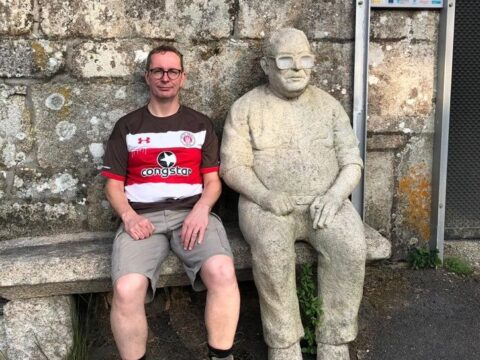 Me and a statue outside a wee church in Spain